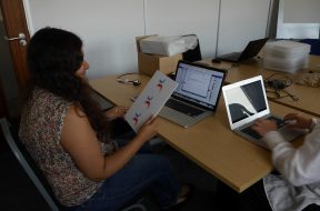 Hera_Hussain_working_on_Wikimania_2014_at_WMUK