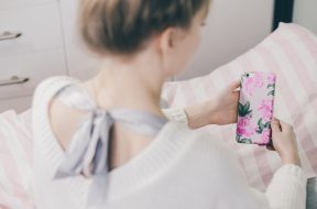 girl_holding_a_phone_in_a_fancy_case