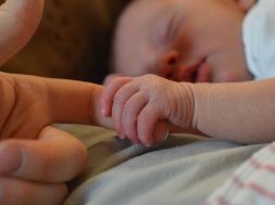 baby-holding-human-finger-225744 (2)