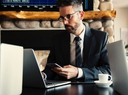 man-in-black-holding-phone-618613