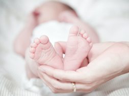 close-up-of-hands-holding-baby-feet-325690